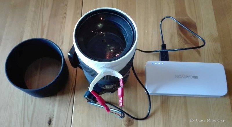 Lens with connected heating band