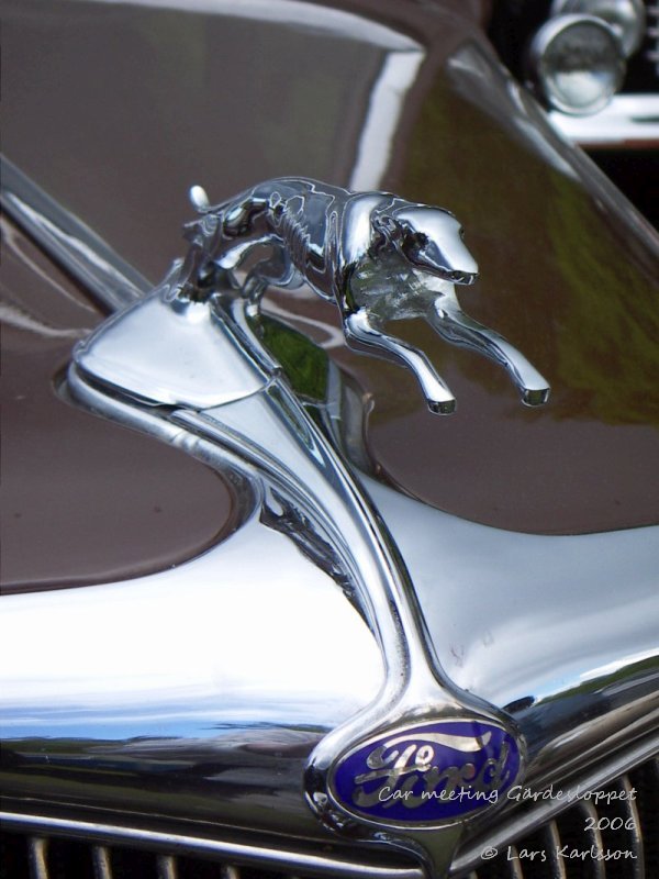 Ford with a Greyhound ornament on the hood