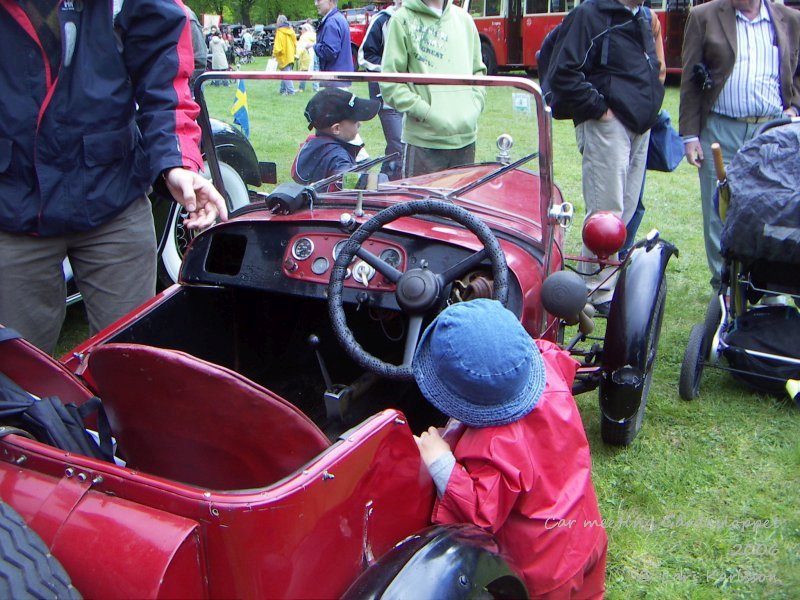 Old British car, 1930s. Has this little boys car interest started today?